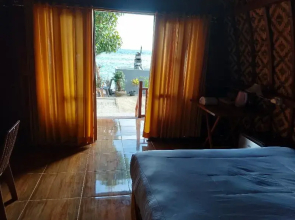 Road Beach Homestay by ZUZU