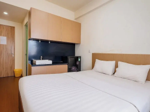 Quintessa Room at Candiland Apartement