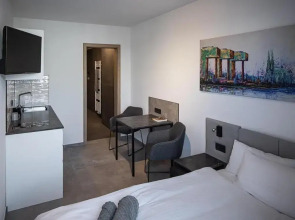 Home & Work Apartments