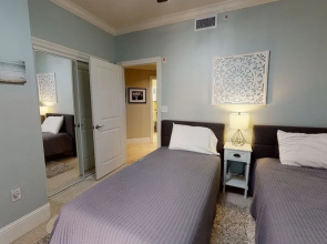 Holiday Isle Unit 122 - Ground Floor Corner Unit - Wrap Around Balcony - Extra Large Floor Plan! 3 Bedroom Condo by RedAwning