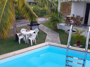 Maison de 2 chambres avec piscine partagee jardin clos et wifi a Le Moule