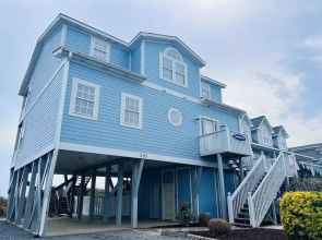 Sunny Times 4 Bedroom Home by RedAwning