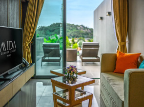 Курортный отель MIDA Grande Resort Phuket