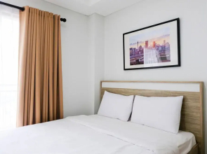 Cozy Studio Apartment with Smart TV at Springwood Residence