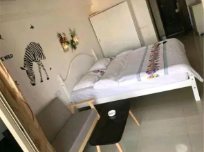 City Xinjia Apartment Hotel