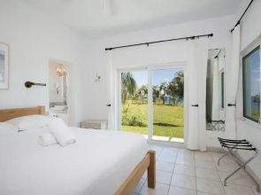 Dream Villa: Private Oasis Above Pink Sand Beach