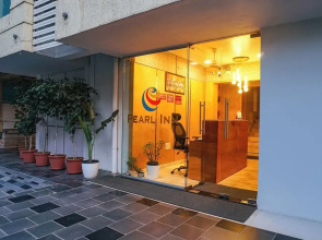 FabHotel Executive Pearl Inn - Nr. Twin tower