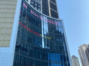 Ganghui Four Seasons Hotel Apartment (Dalian Railway Station Zhongshan Square)