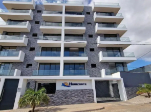 Apartamento encantador com piscina e vista mar