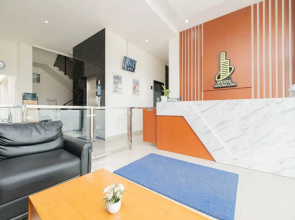RedLiving Syariah Apartemen MKostel - Tower A1 Kencana Loka