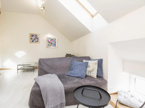 Beachfront Art Gallery Mansard One Bedroom Suite in Historic Bath-House