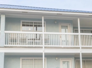 Sun Kissed Beachside Condo With Pool