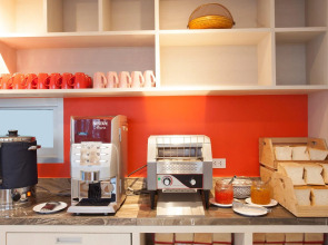 Отель Recenta Suite Phuket Suanluang