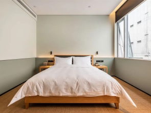 Kuaile Meiju Business Hotel