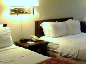 Merit Hotel & Suites