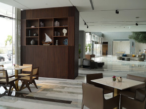 Отель Mövenpick Jumeirah Village Triangle