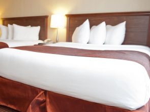 Merit Hotel & Suites