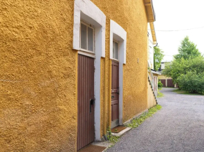 A bright wooden studio for four