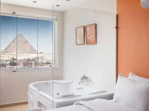 Xuru Stays I Jacuzzi Studios @ The Pyramids