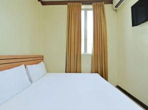SPOT ON 92255 Lucky Guesthouse