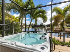 Villa Neptune's Grotto- BRAND NEW with heated Pool, Hot Tub, and dock with Tiki