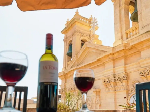 A Pretty Duplex Apartment in a Gozo Village Square