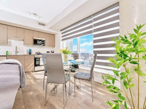 Deluxe 1BR Condo - City Views From Your Balcony