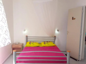 Maison de 2 chambres avec vue sur la mer jardin clos et wifi a Vieux Habitants a 2 km de la plage