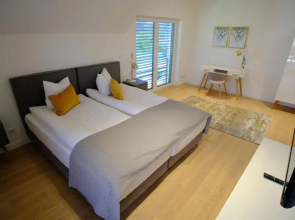 Max White Apartments