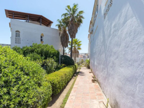 Benalmadena: adosado con piscina y jardin