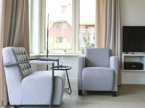 Wellness villa with sauna, at a holiday park on the water in Friesland