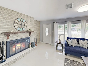 New Listing! Updated W/ Caged Pool & Patio 4 Bedroom Home