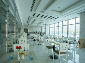 Отель City Avenue Al Reqqa Hotel