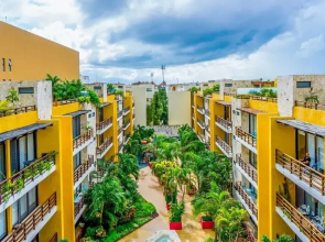 Lunada 314 Modern Playa del Carmen Condo with Tropical Garden View by RedAwning