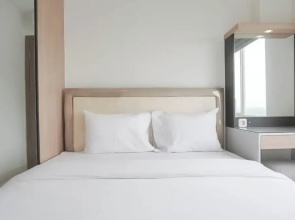 Homey and Minimalist 2BR at Podomoro Golf View Apartment