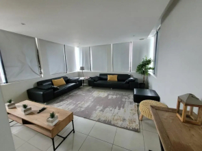 Accommodation Front - Exquisite 6 Sleeper Apartment with Ocean Views