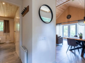 Forest Lodge in Nature With Pond Views