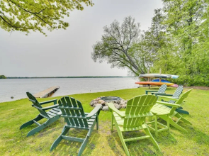 Cozy Carp Lake Cottage w/ Dock, Kayaks & Fire Pit