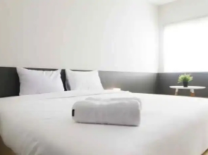 Studio Comfy Room at Oasis Apartment By Travelio