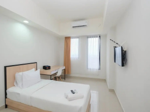 Comfort and Strategic Studio at Evenciio Apartment near Campus Area