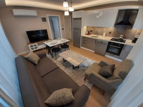 Alpha Apartments