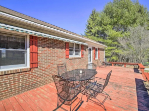 Quaint Creekside Home w/ Spacious Deck & Yard