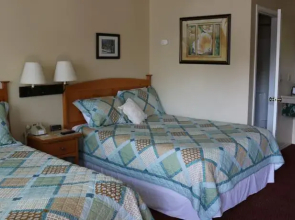 Whispering Firs Motel & RV Park