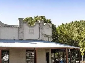 The Commercial Quarters - Room 2-has air conditioning, free WIFI, TV and fridge