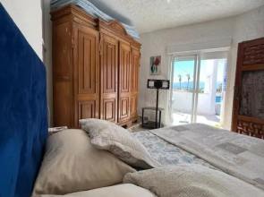 Maison pied sur mer