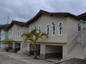 Condomínio Brisa da Praia - Casas com 2 dormitórios, churrasqueira privativa e 3 vagas de garagem