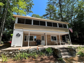 Water's Edge Limit 8 4 Bedroom Cottage by RedAwning