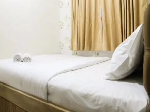 Simple 2BR Green Pramuka Apartment