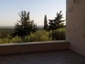 Tzitzifes Stone Mansion
