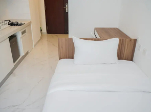 Nice And Comfort Studio Room At Sky House Bsd Apartment